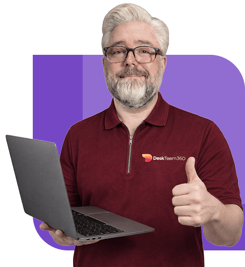 Team member giving a thumbs up with a laptop